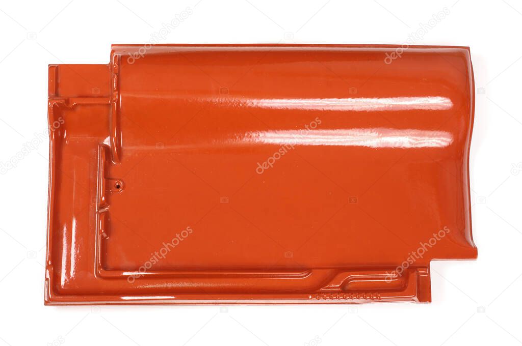Single new shinny red roof tile isolated on the white background