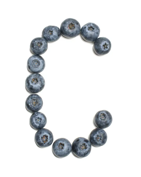 Alphabet letter C arranged from highbush blueberry isolated — Stock Photo, Image
