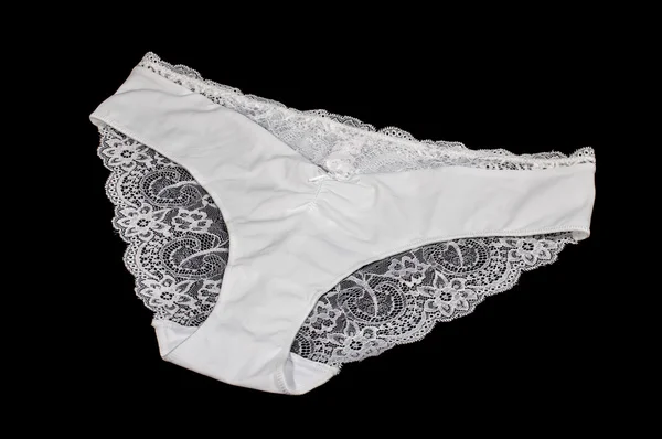 White lacy lingerie isolated on the black background — Stock Photo, Image