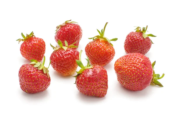 Many strawberries isolated on the white background — Stock Photo, Image