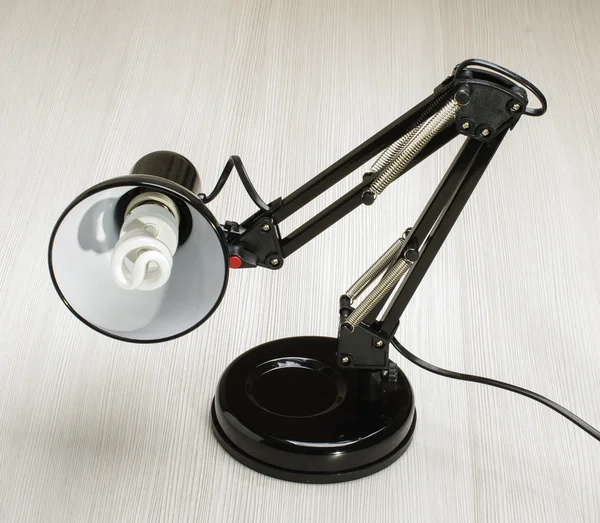 Lámpara de escritorio negra ajustable en el fondo brillante — Foto de Stock