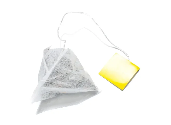 Pyramid shape teabag on the white background — Stock Photo, Image