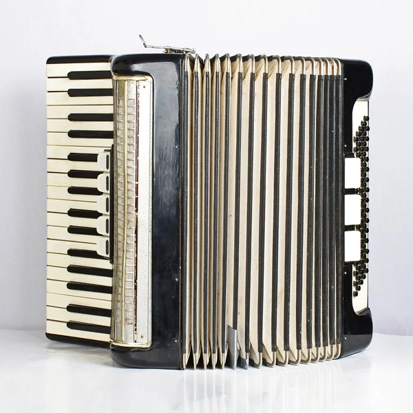 Black accordion opened — Stock Photo, Image