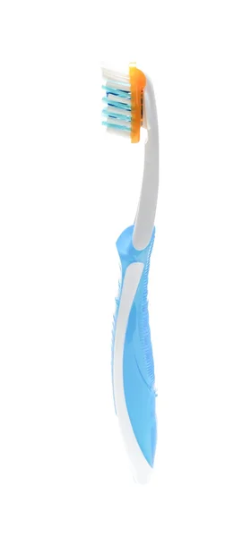 Toothbrush standing on the white background — Stock Photo, Image
