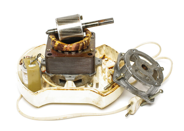 Old juicer motor deconstructed isolated on the white background