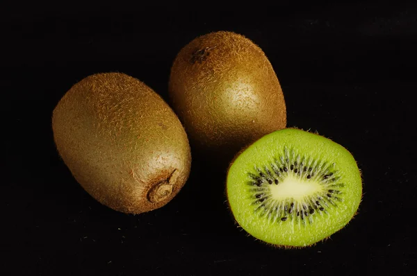 Organic kiwi fruit isolated on the black background — Stock Photo, Image