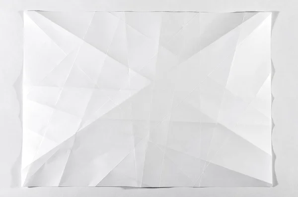 Beyaz boş belge katlanmış — Stok fotoğraf