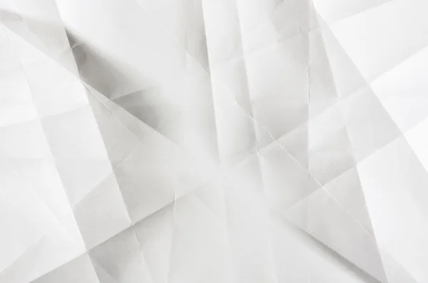 Grautöne auf dem weißen gefalteten Papier — Stockfoto