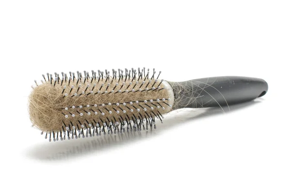 Hairbrush with lost hairs with clipping path — Stock Photo, Image