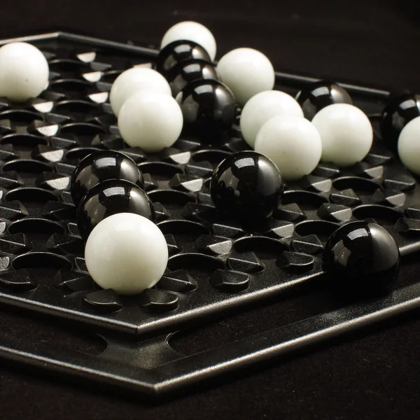 Abalone game white and black marble balls — Stock Photo, Image