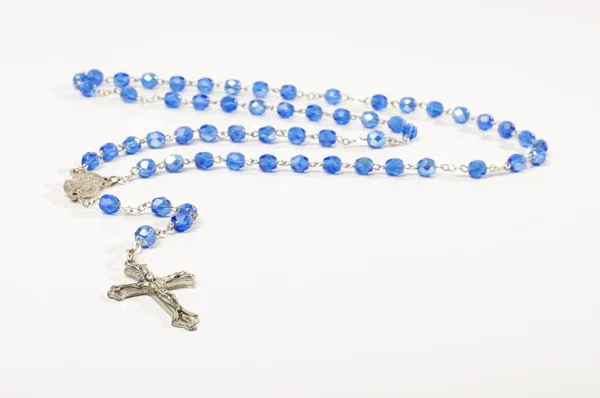 Prayer rosary isolated on the bright background — Stock Photo, Image