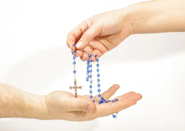 stock image Female hand sharing rosary with male hand