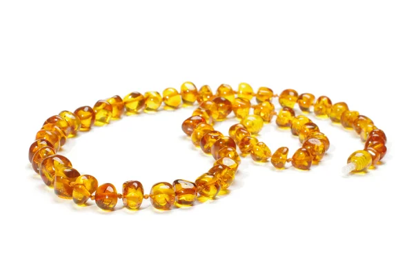 Bright amber necklace isolated on the white background — Stock Photo, Image