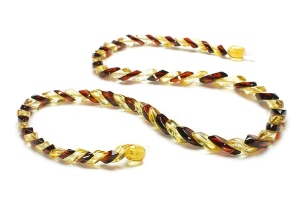 Fashionable snake type amber necklace isolated — Stock Photo, Image