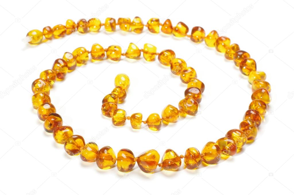 Amber necklace in spiral isolated with clipping path