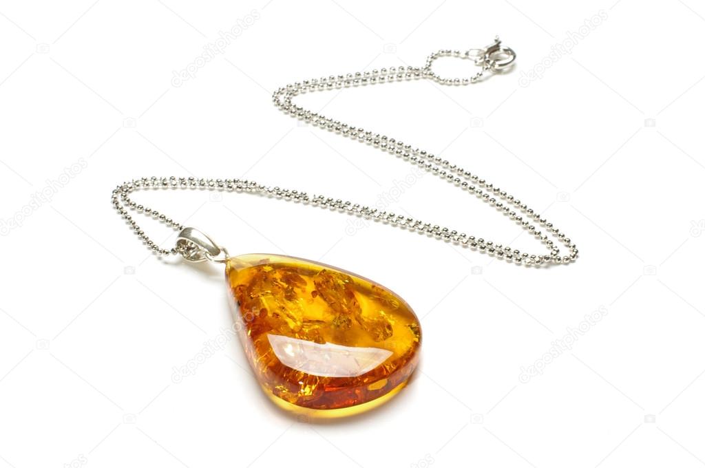 Amber drop shape pendant isolated on the white background