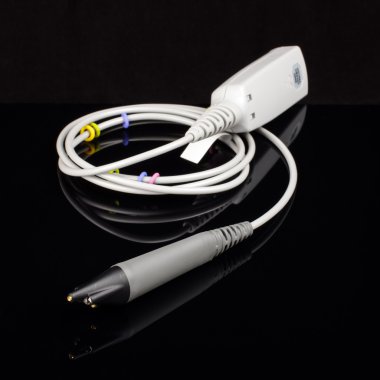 Oscilloscope probe isolated on the black background with reflection clipart