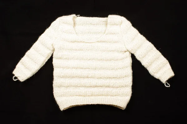 Baby handmade alpaca wool sweater isolated on the black background — Stock Photo, Image