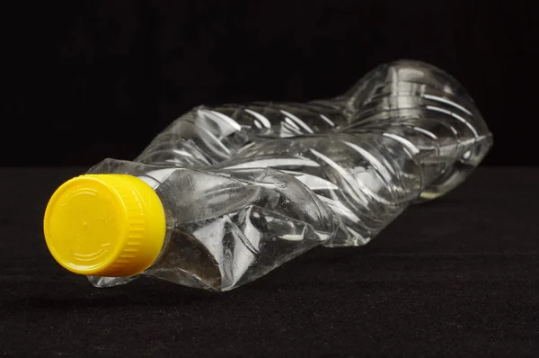 Spożycia przez pojęcie używane plastikowe butelki oleju — Zdjęcie stockowe