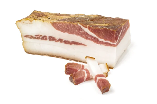 Smoked bacon and three sliced peaces isolated on the white background — Stock Photo, Image