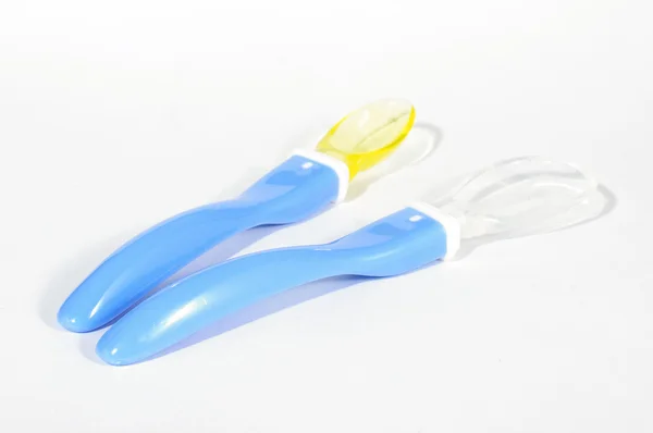 Pair of soft silicone baby feeding spoon isolated top view — Stock Photo, Image