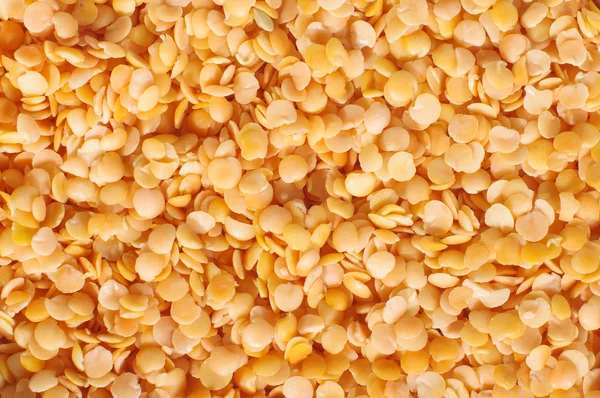 Red lentils abstract surface pattern — Stock Photo, Image