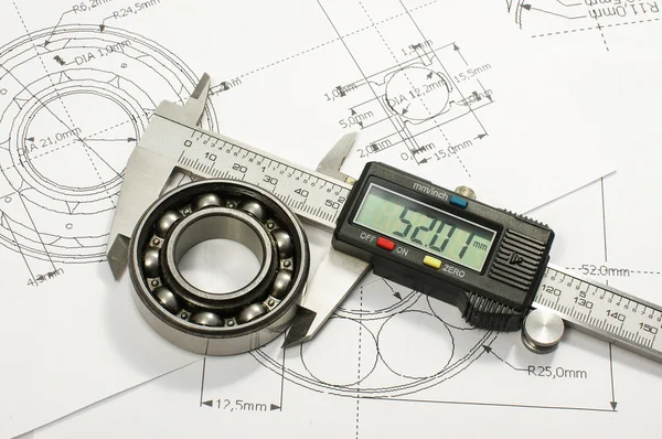 Bearing and caliper on the mechanical engineering drawing — Stock Photo, Image