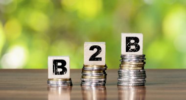 B2B 'den iş dünyasının pazarlama sembolüne. E-ticaret ya da ekonomi ve finans kavramı. Paraşüt işareti