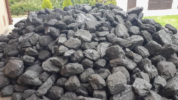 Pile Of Black Coal. Fuel and energy for home and industry. hard coal is harmful, high exhaust emissions. Mining and mining of coal