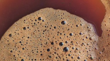 Kahve köpüğü çok yakın. Tam Çerçeve Kahve. Makro doku ve arkaplan