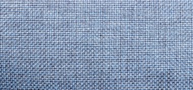 Arka plan tasarımı veya tekstil uygulamaları için mavi desenli yakın çekim ideal. Örgü deseni çeşitli yaratıcı projeler için uygun derinlik ve boyut ekler.