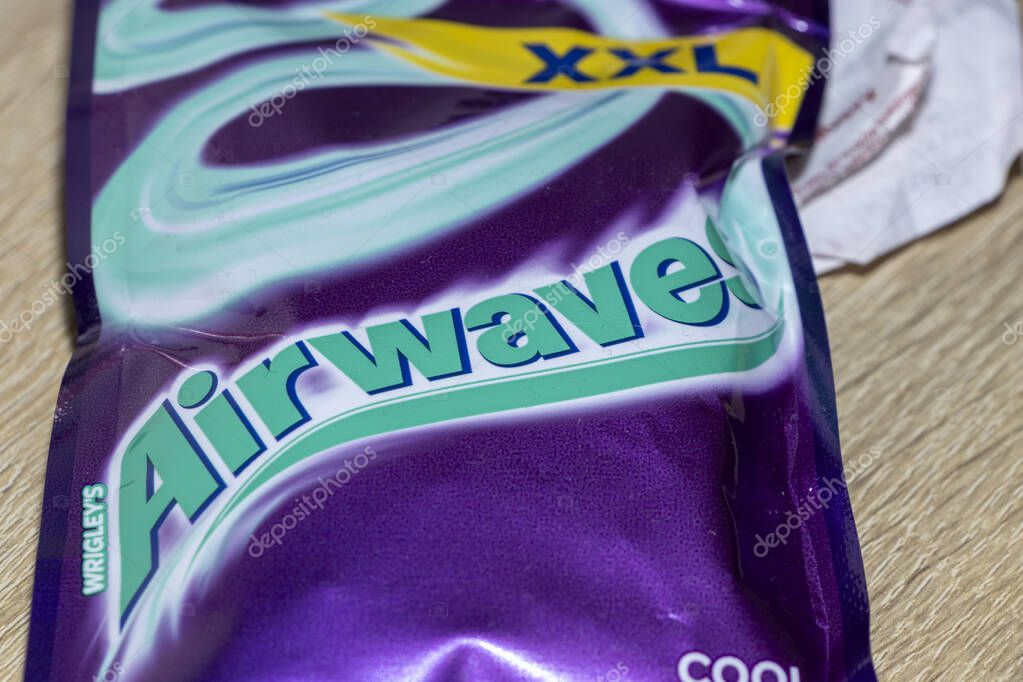 Warsaw Poland - October 8 2025: A close-up shot of a Wrigleys Airwave XXL chewing gum packet showcasing its vibrant colors and design.