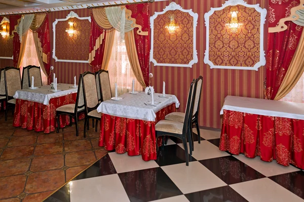 Cafe table in red interior — Stock Photo, Image