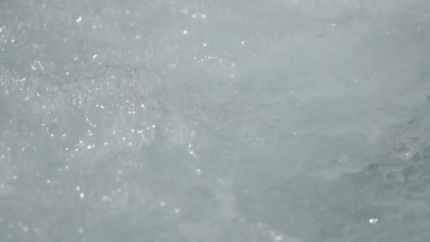 Slow motion bubbling water in whirlpool — Stock Video