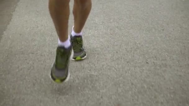 Jogging pernas câmera lenta — Vídeo de Stock