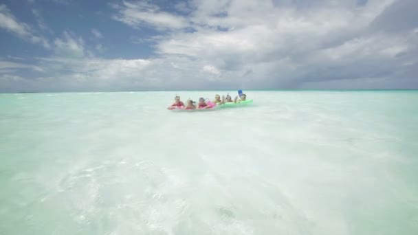 Family having fun on airbeds — Stock Video