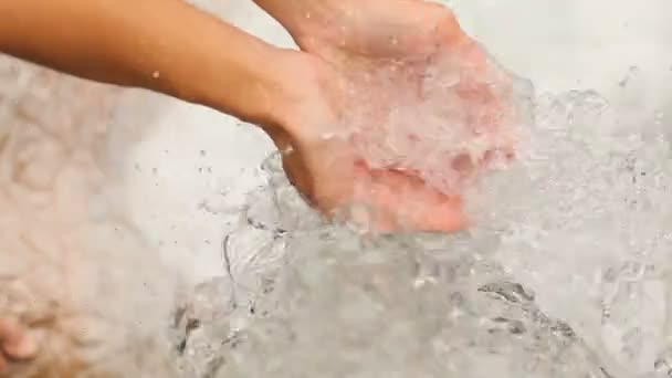 Catching water with hands — Stock Video