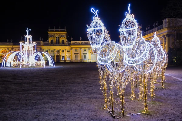 Kerst illuminations in het park in Wilanow nachts — Stockfoto