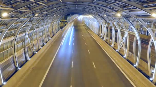 Traffic in modern tunnel - timelapse, zoom in — Stock Video