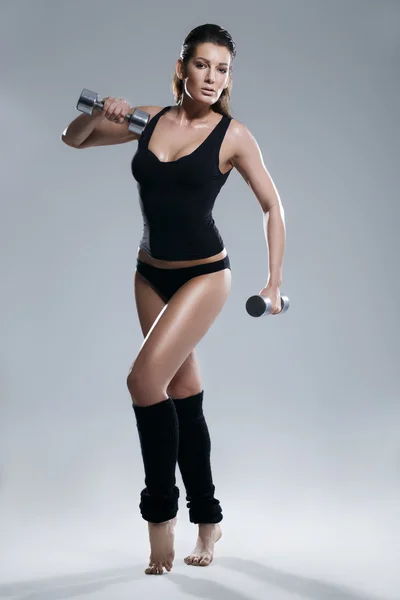 Female exerciser weights — Stock Photo, Image