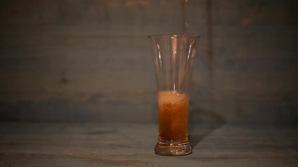 Beer poured into a glass — Stock Video