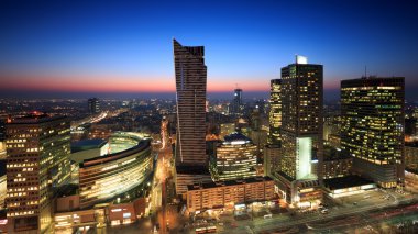 Warsaw city center at sunset clipart
