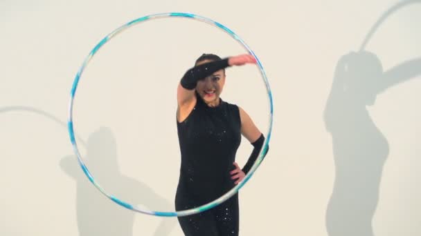 Spinning acrobat beautiful hula hoops in slow motion — Stock Video