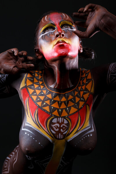 Bodypainting. Woman painted with ethnic patterns