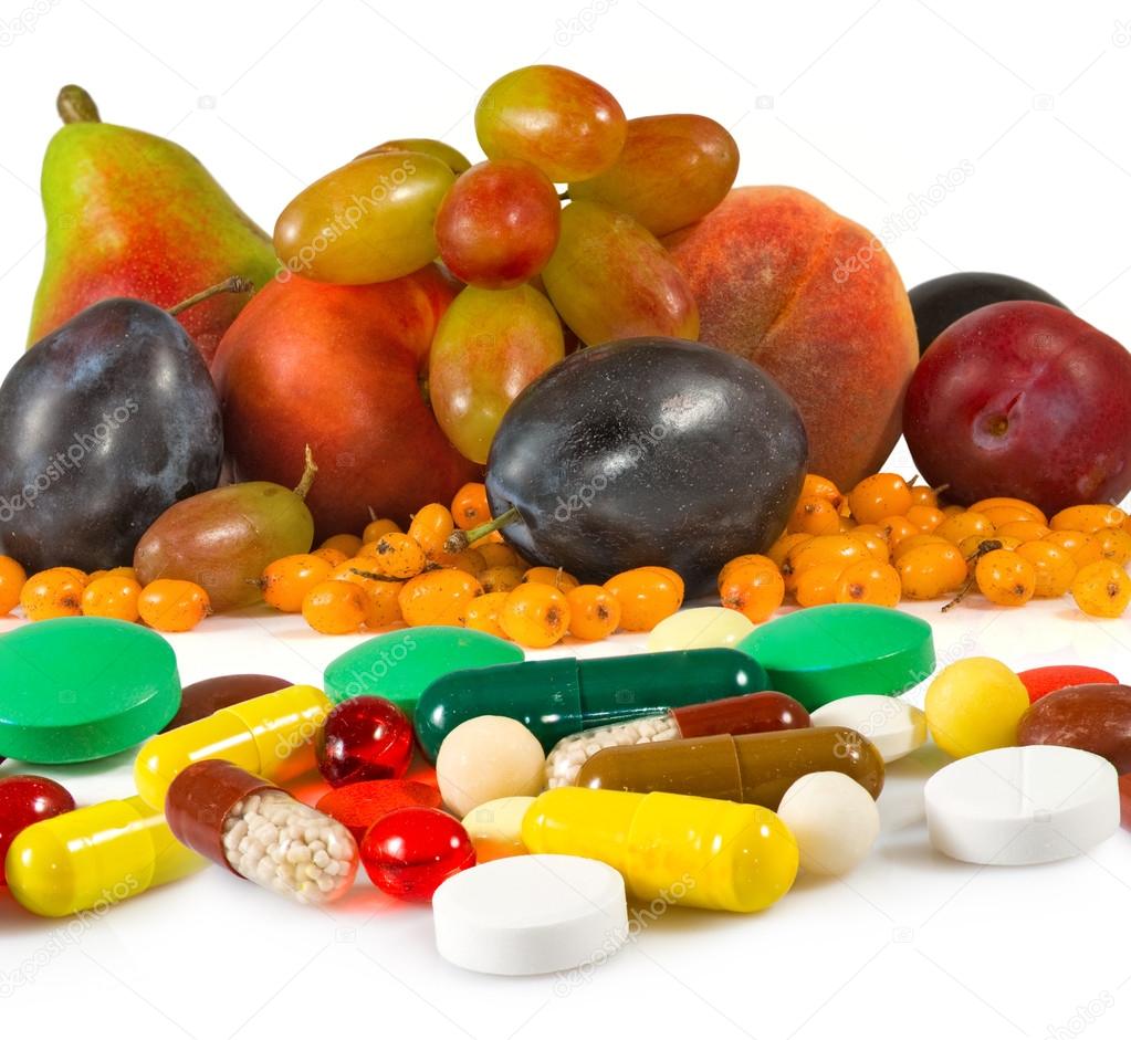 image of different fruits and pills closeup
