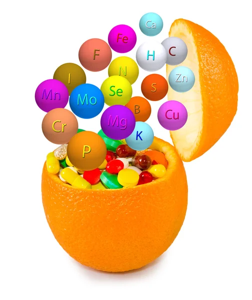 Isolated image of pills inside orange close up — Stock Photo, Image
