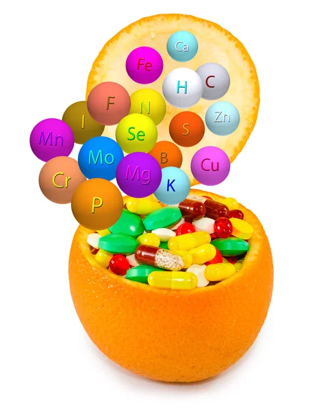 Isolated image of pills inside orange close-up — Stock Photo, Image