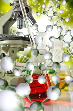 Laboratuar kapkacakları ve Dna strand arka plan yakın çekim üzerinde mikroskobu görüntüsü