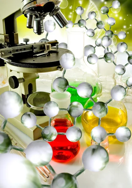 Laboratuar kapkacakları ve Dna strand arka plan yakın çekim üzerinde mikroskobu görüntüsü