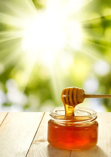 Immagine di miele su un primo piano di tavolo — Foto Stock